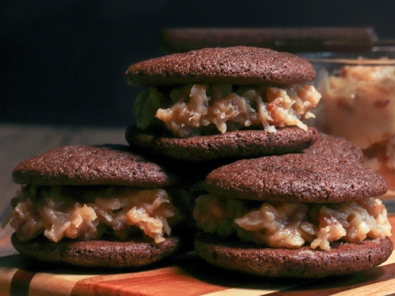 Chocolate Cookie Sandwiches with Coconut Pecan Frosting