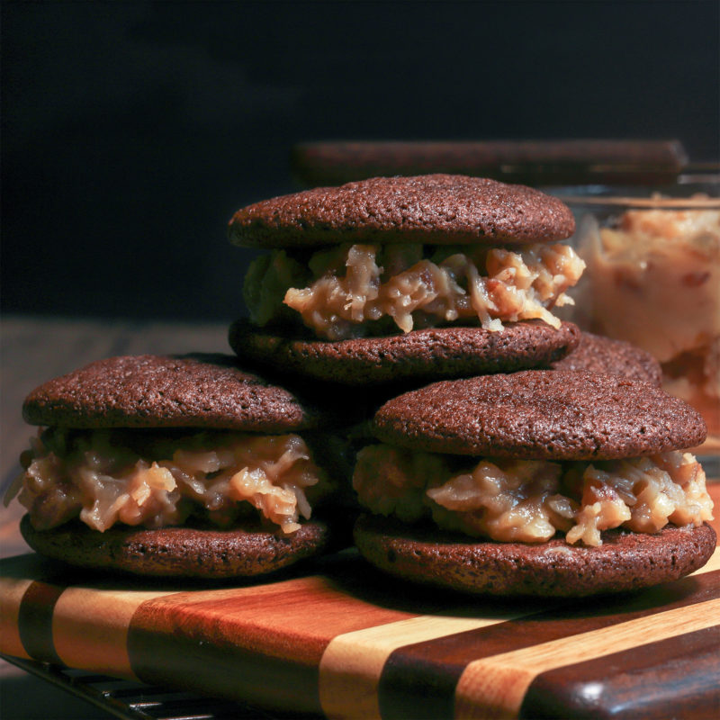 Chocolate Cookie Sandwiches with Coconut Pecan Frosting