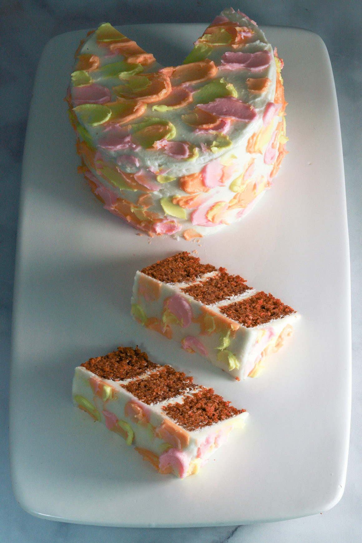 carrot cake and cake slices on long platter