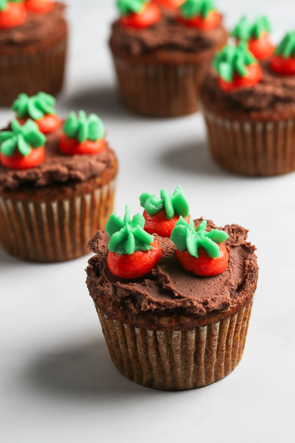 carrot cake cupcakes with carrot decorations