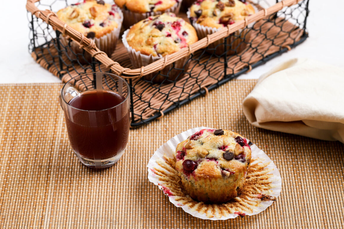 orange muffins with cranberries and walnuts